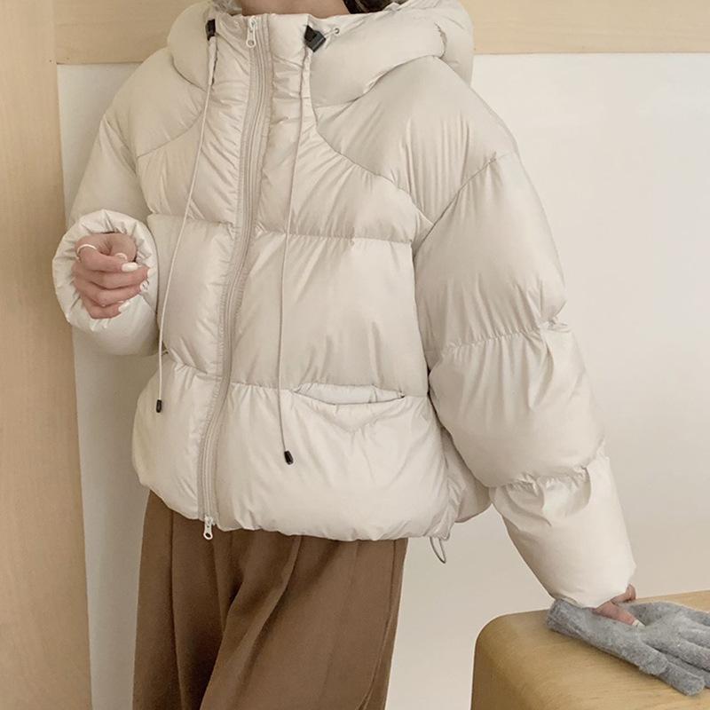 

Gutless direct charging high-quality white duck down jacket women s short 2025 new thickened puff-feeling hooded bread jacket S слоновая кость