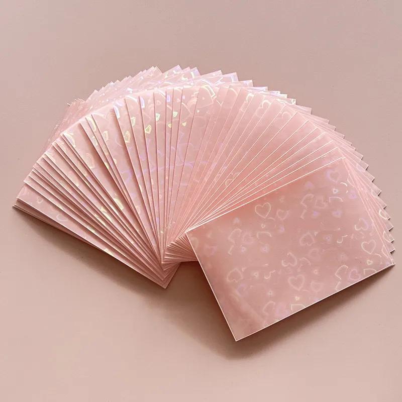 50pcs/lot 61*91mm Heart Love Laser Flashing Card Sleeves Protector For Photo Cards Holder Holographic Foil Protective Films