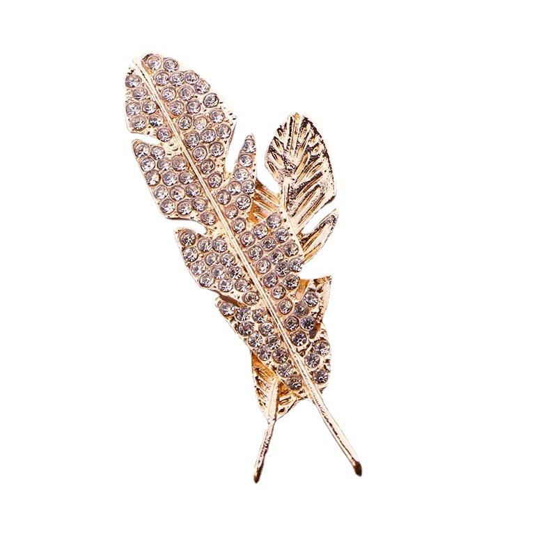 

Брошь в виде листа и пера из горного хрусталя, геометрический цилиндр, маленькая булавка, яркие белые стразы, ювелирные изделия, аксессуары