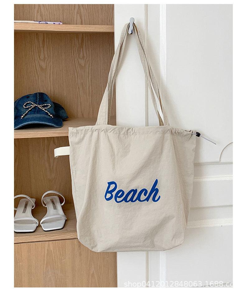 

Korean niche tray extra-large bag women s 2025 new large-capacity nylon cloth shoulder bag casual literary commuter bag хаки