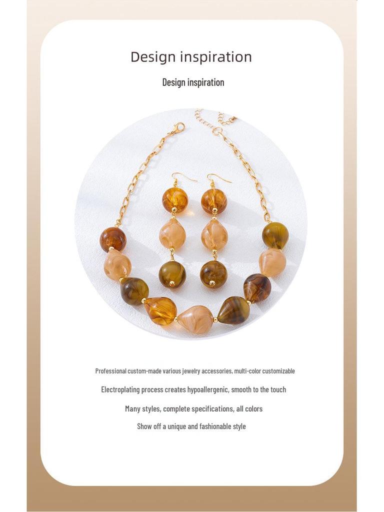 European Retro Holiday Style Two-Tone Acrylic Jewelry Set: Water Drop Earrings & Necklace