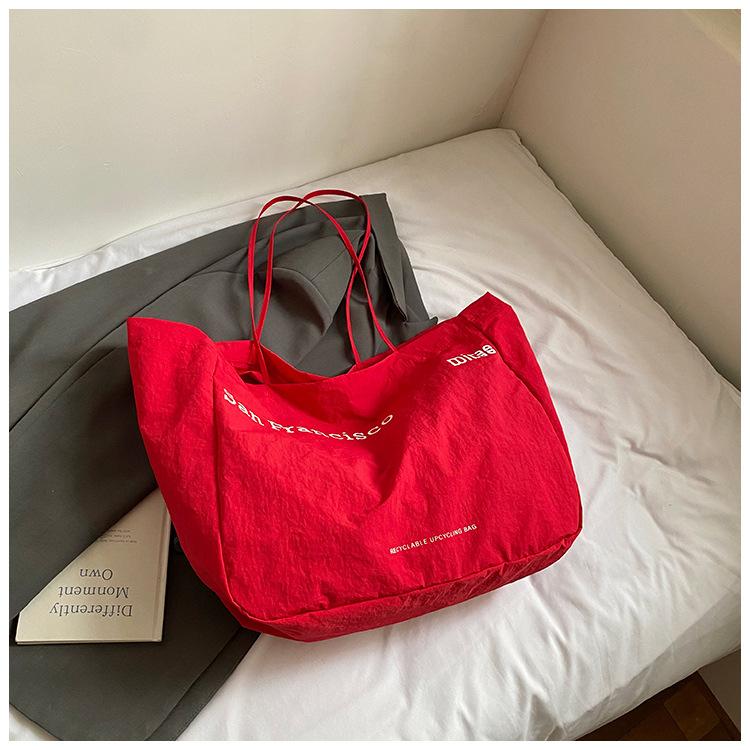 

2025 summer new tote bag niche Korean version large-capacity canvas bag women s ins niche portable shoulder bag красный