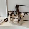 Canvas bag Women's oneshoulder literary and artistic largecapacity student tote bag Class versatile makeup bag Crossbody backpack