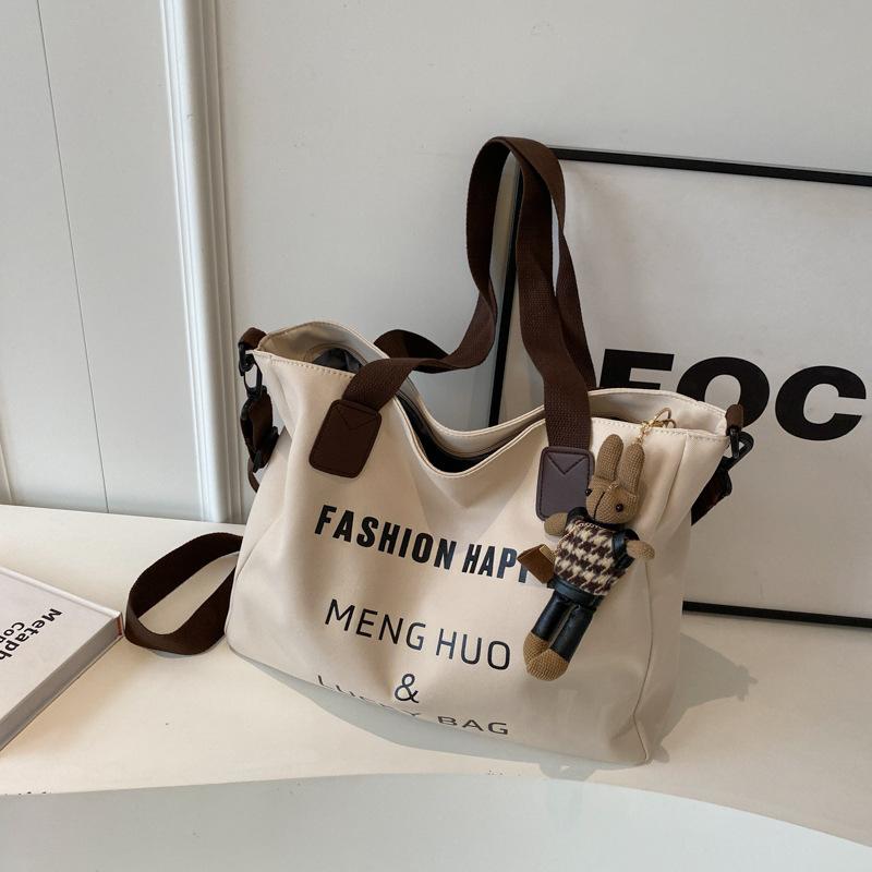 Canvas bag Women's oneshoulder literary and artistic largecapacity student tote bag Class versatile makeup bag Crossbody backpack