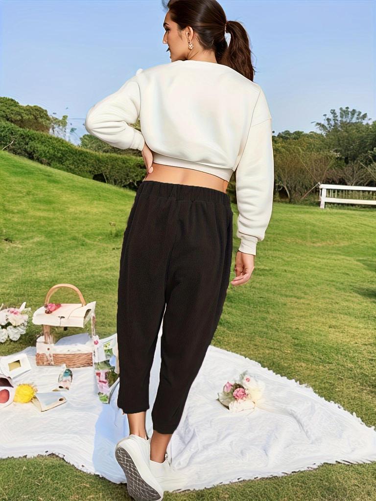 European & American Women's Corduroy Pants - Elastic Waist, Pocketed, Loose Fit, Tapered Leg, 2026 Autumn/Winter Collection