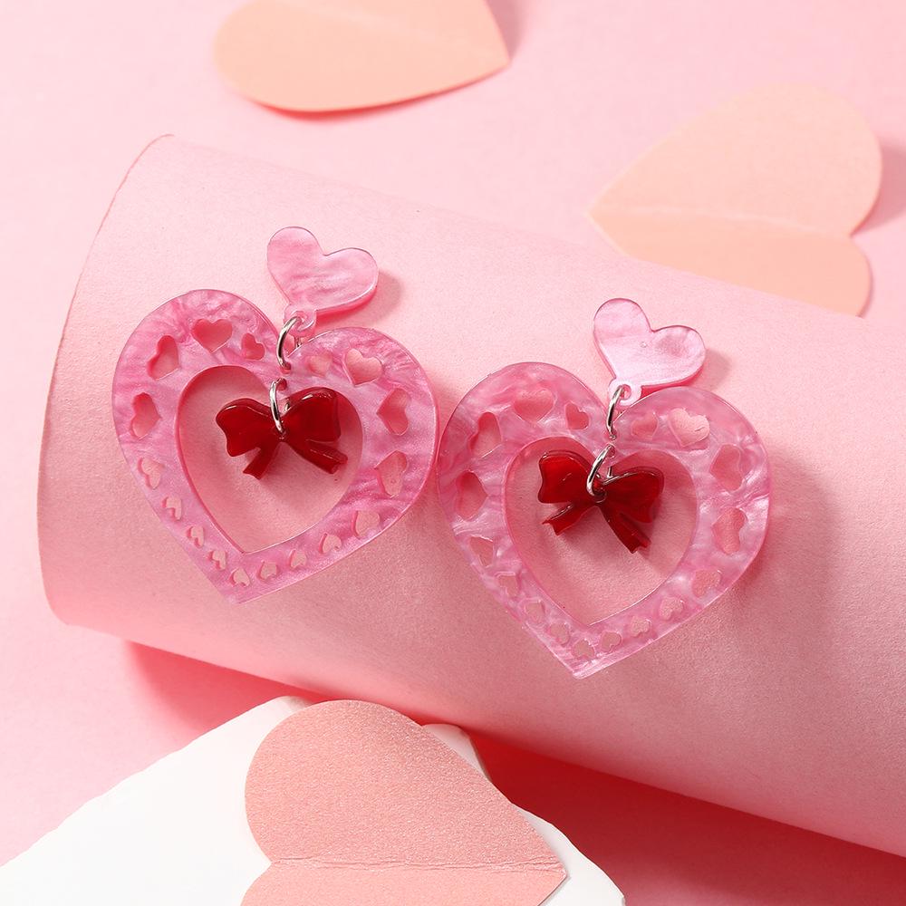 Stylish Heart-Shaped Acrylic Earrings with Hollow Design & Fluorescent Accents
