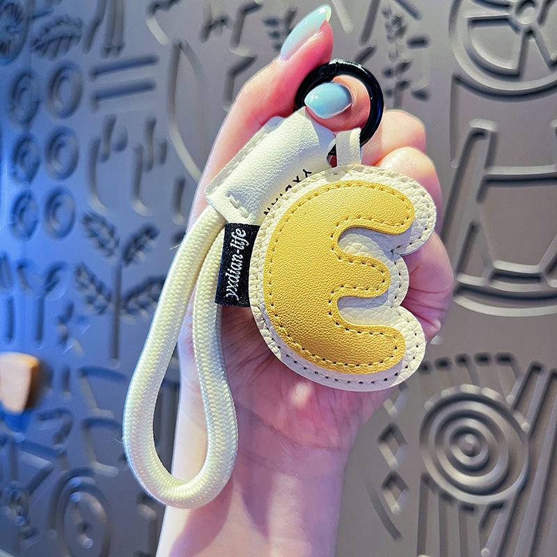 

Креативный Изысканный Брелок с 26 Английскими Буквами из ПУ Кожи, Подвески для Сумки с Алфавитом, Брелок-Орнамент, Счастливый Кулон, Подарок для Пары