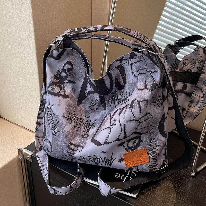 

Tote bag women s 2024 new large-capacity commuter leisure bag cloth bag shoulder messenger bag premium backpack синій