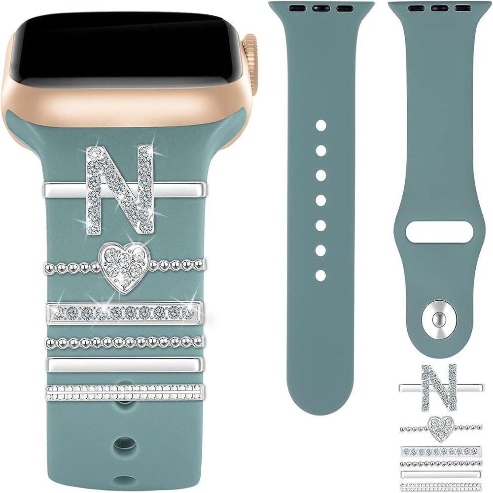 

Ініціали Літера Декоративна каблучка Діамант Наручний ремінь Підвіски Ремінець годинника Орнамент Ремінець Аксесуари N