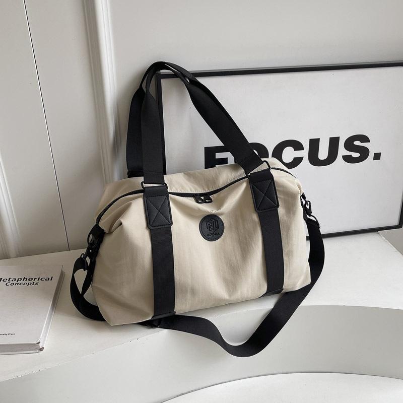 Korean Version of Simple Fashion Fitness Bag Large Capacity Hand Luggage Bag Women's Sports Travel Bag Portable Trend