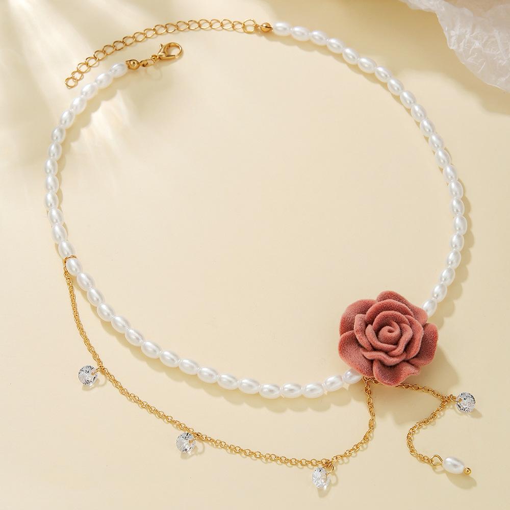 Japan and Korea fashion flower imitation pearl necklace, retro rhinestone bow temperament collarbone chain women's jewelry