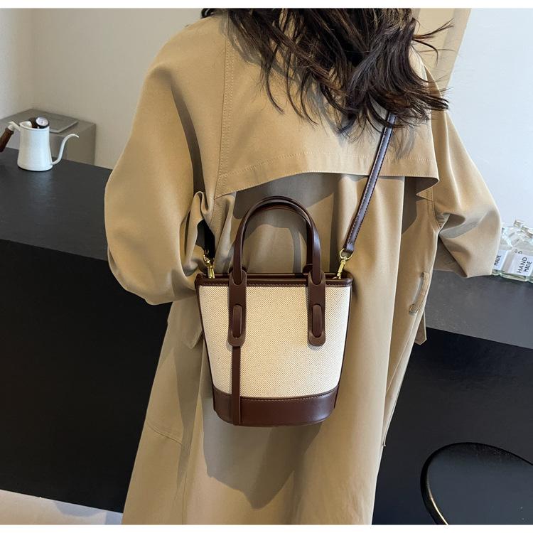 1 szt. 2025 Wybuchowa kontrastowa torba typu wiadro damska uniwersalna torba na ramię do pracy w mieście prosta torba premium wiatrówka