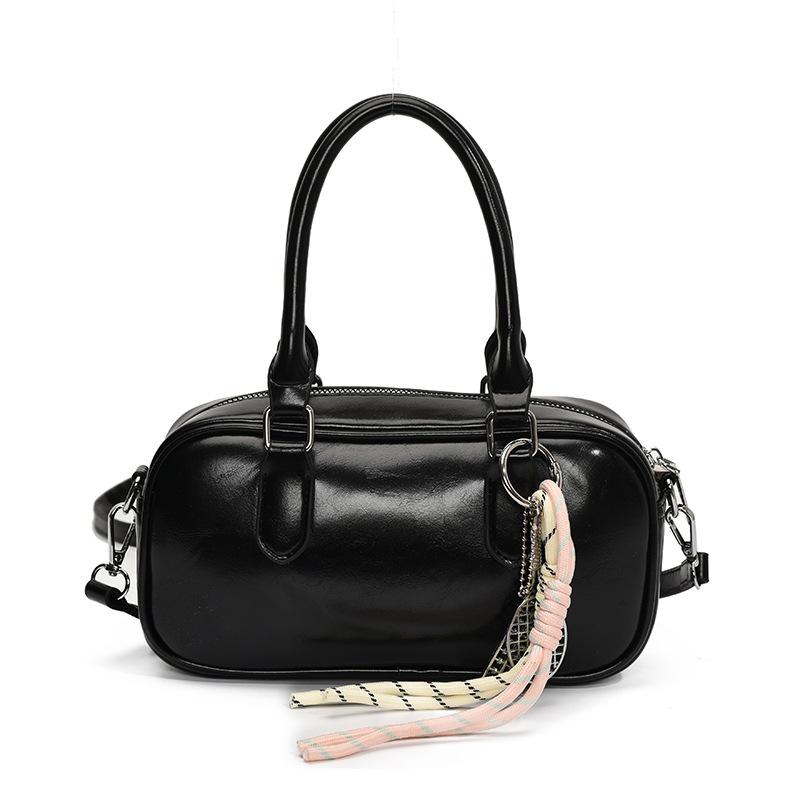 Retro commuting simple Korean version casual solid color portable bowling bag fashion high sense versatile commuting messenger bag