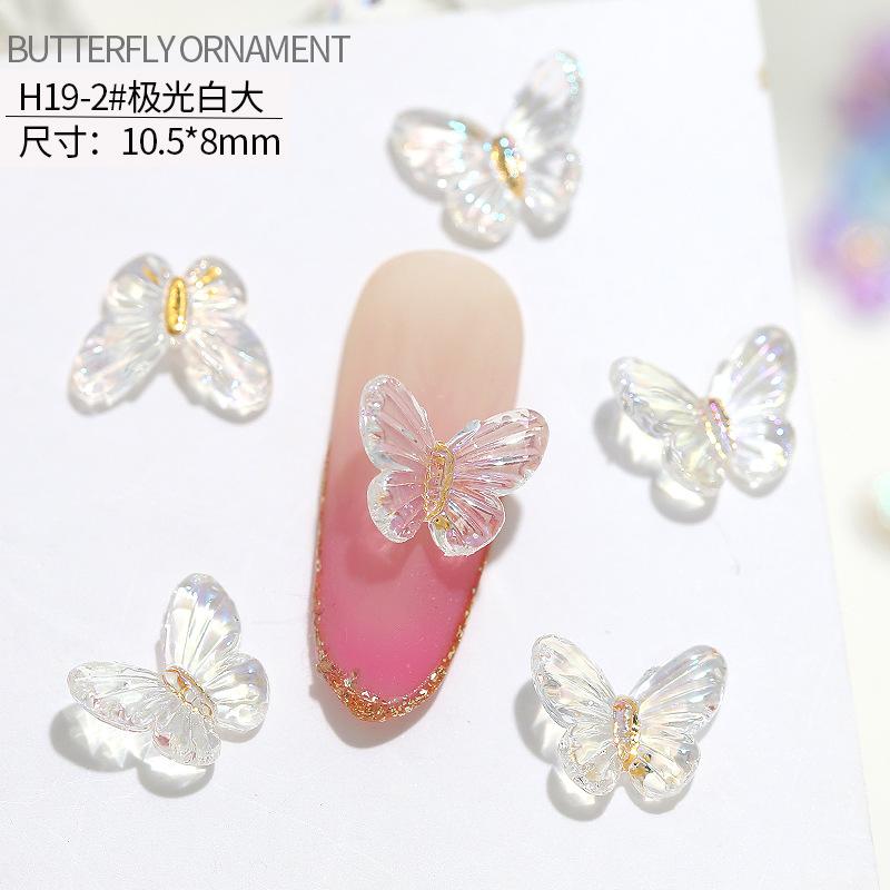 20 stuks vlinder nagelkunst accessoires - nageldecoraties met iriserende en driedimensionale vlinders gemaakt van hars voor nagelkunst.