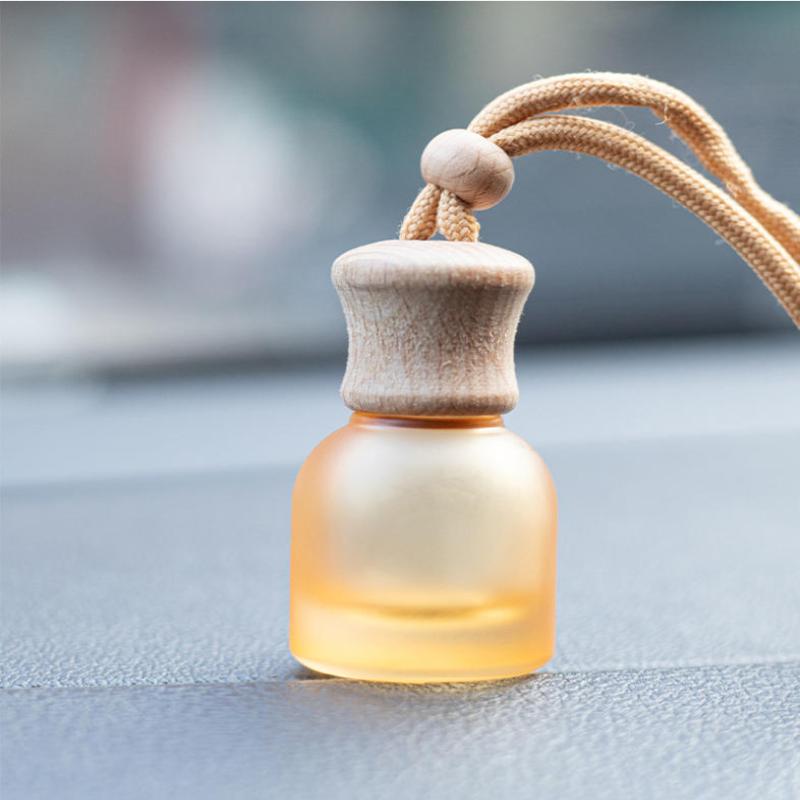 1 Stück nachfüllbare Auto ätherisches Öl Diffusor Flasche 11 ml Leerer Auto Lufterfrischer Anhänger Parfüm Glasflasche mit Holzkappen