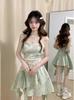 Spring New Girl Style Sweet Green Sleeveless Suspender Skirt Student Waist Thin Irregular Medium and Long Skirt