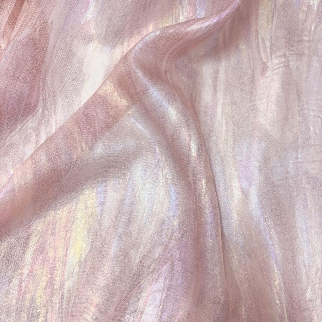 Drapeable semi-transparent pink lustrous gold-textured fabric suitable for wedding dresses formal gown designer clothing fabrics