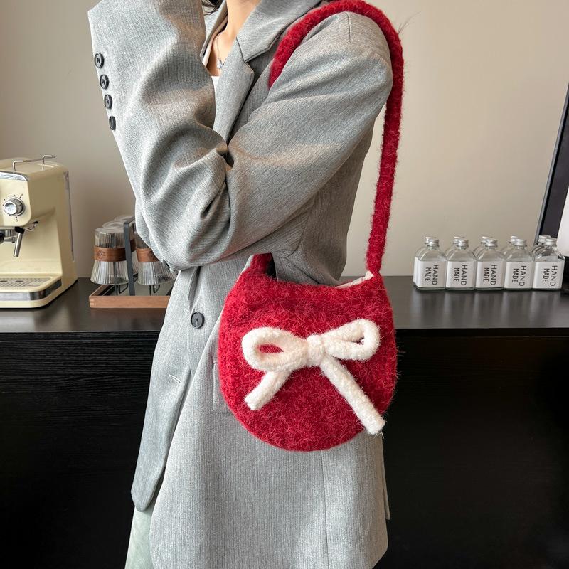Korean spring new fashion niche design large-capacity student foreign style bucket bag women's shoulder trend oblique span bag