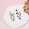 New French retro semi-three-dimensional heart-to-heart pointed peach earrings personality niche simple fashion model