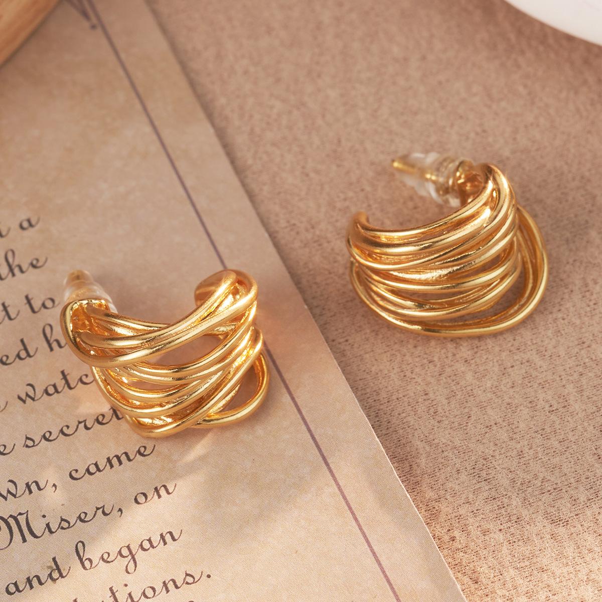 

European and American multi-layer winding C-shaped versatile niche light luxury metal wind cross-border advanced earrings personalized fashion medieval gold