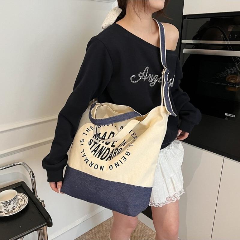 Niche casual canvas bag women's spring and summer new students class commuting shoulder bag trendy messenger bag