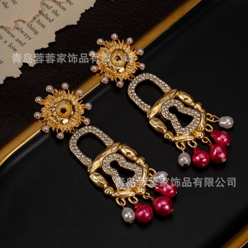 Middle Aged High-end Earrings Xiapa Runway Style Sun Eye Lock Pearl Exaggerated Personality Feel