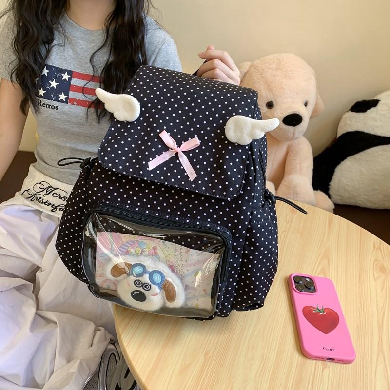 Korean schoolbag female wings polka dot retro high-value backpack female cute transparent pain bag casual play backpack