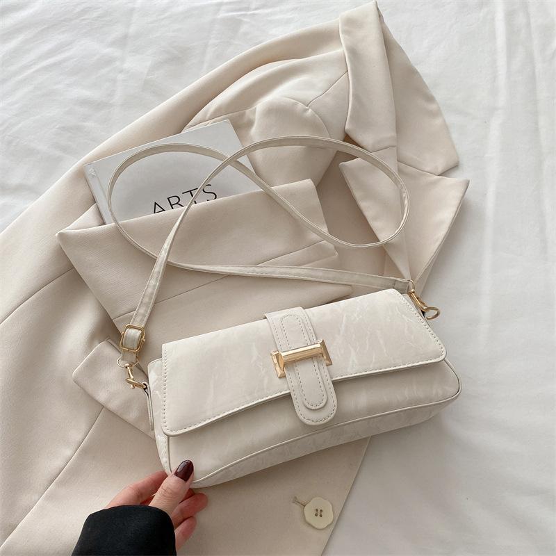 French Niche Design Bag Women's 2025 New Popular Versatile Messenger Bag High-end Single Shoulder Underarm Baguette Bag