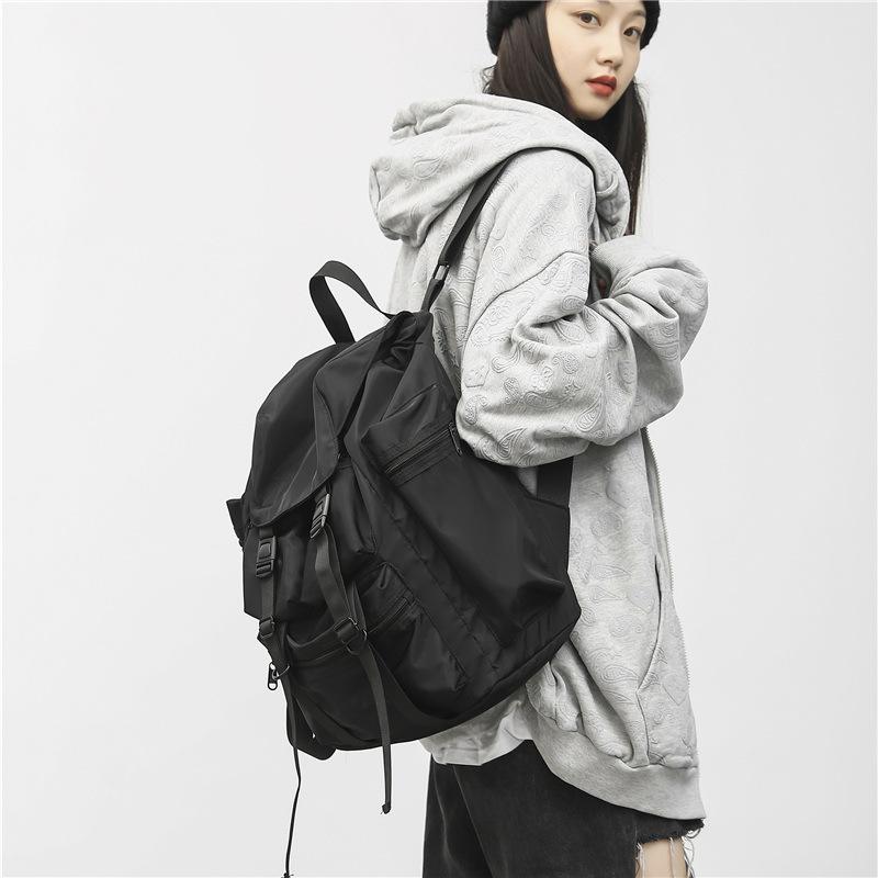 

Tide brand functional backpack male niche Japanese college student black schoolbag large capacity outdoor mountaineering travel backpack 31*17*40