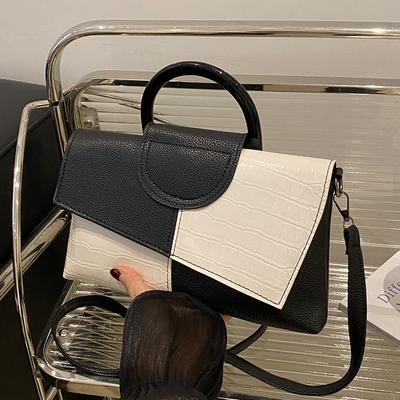 Bolsa de nicho Premium Sense com emendas em cores contrastantes Bolsa de ombro versátil para mulheres Bolsa mensageiro de nicho