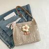 Niche Knitted Bucket Bag New Style Class Commuter Tote Bag Women's Large Capacity Vacation One-shoulder Straw Woven Bag