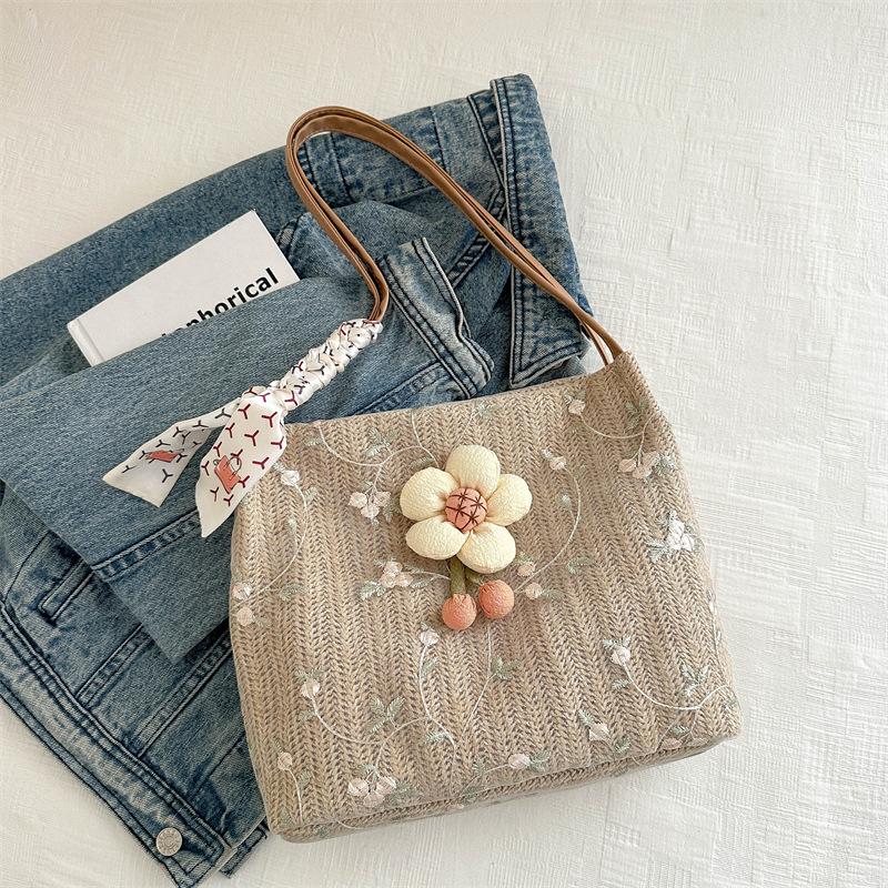 Niche Knitted Bucket Bag New Style Class Commuter Tote Bag Women's Large Capacity Vacation One-shoulder Straw Woven Bag