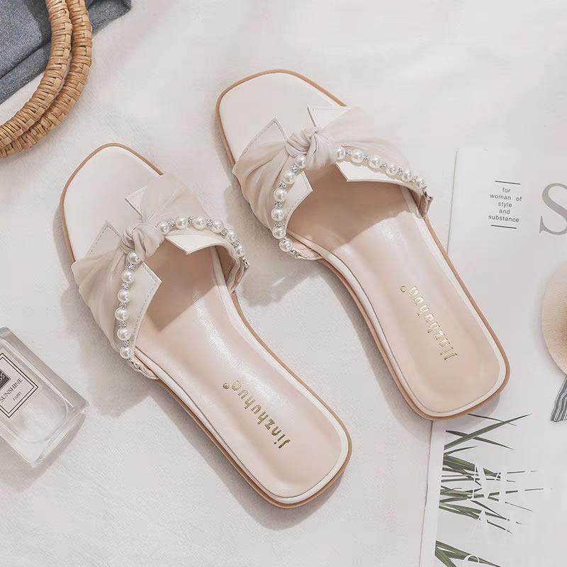 

Летние новинки 2025 года Женские тапочки Бантик Повседневный стиль Плоская подошва Пляжные сандалии Нейлоновый материал Взрослый размер Элемент бабочки 40 абрикосовый