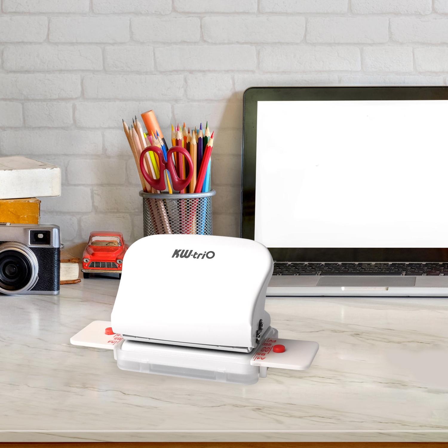 Ручной металлический перфоратор белый