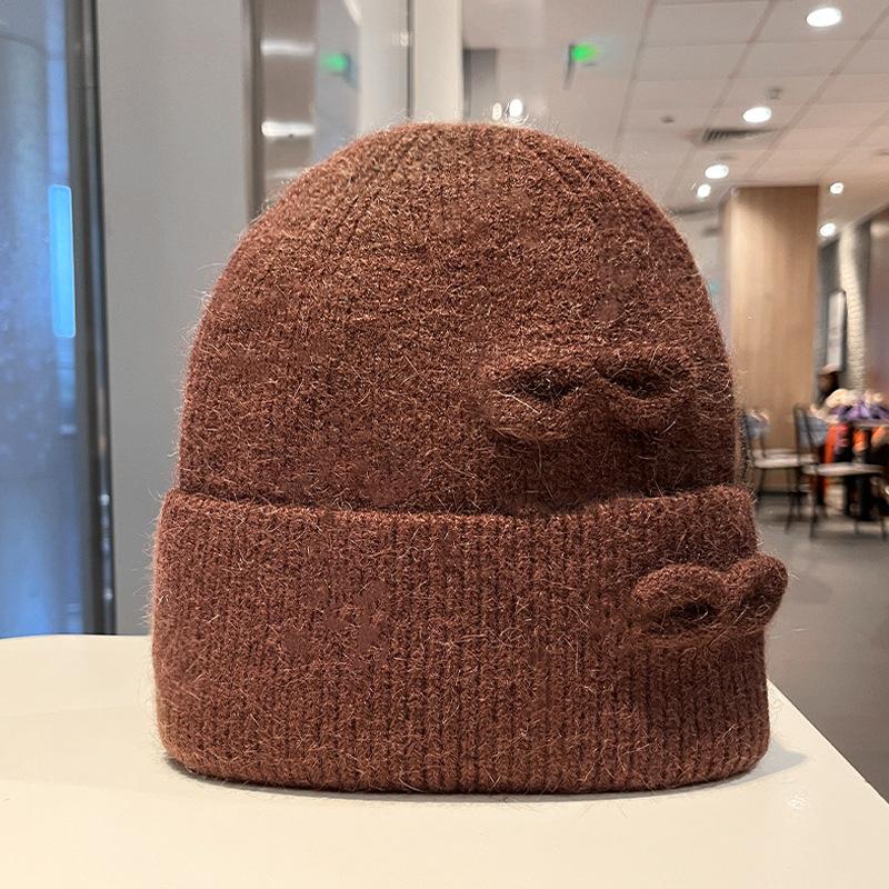 Korean version of fashion hole knitted wool hat men and women autumn and winter outdoor warm bag head cold hat lazy knitted hat