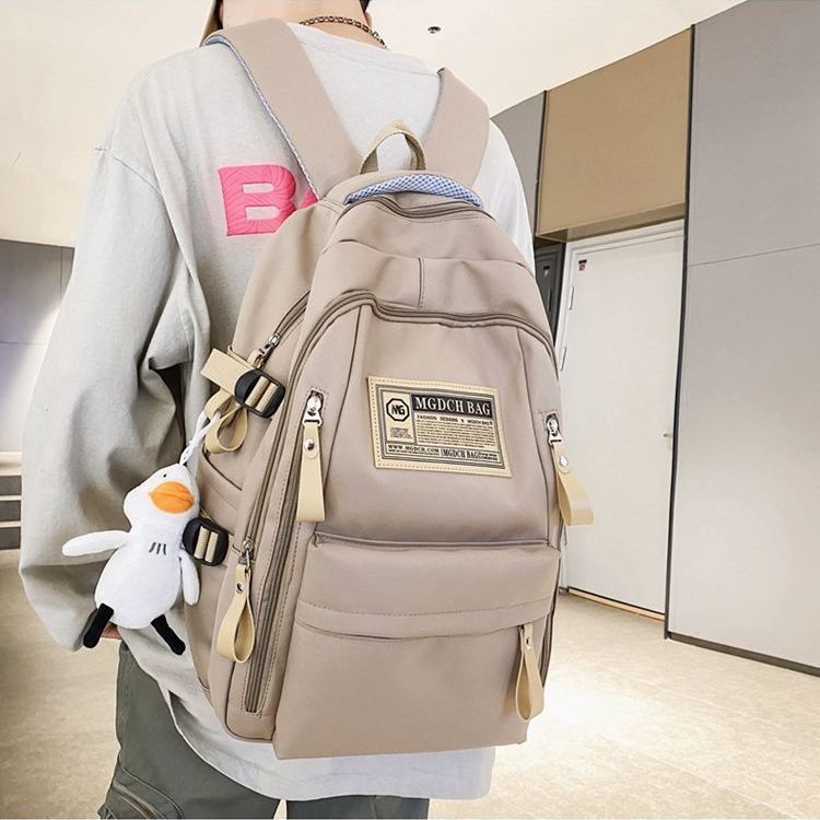 Schoolbag Multi-layer spine protection schoolbag Large capacity retro backpack 1011 New junior high school student high school student going out