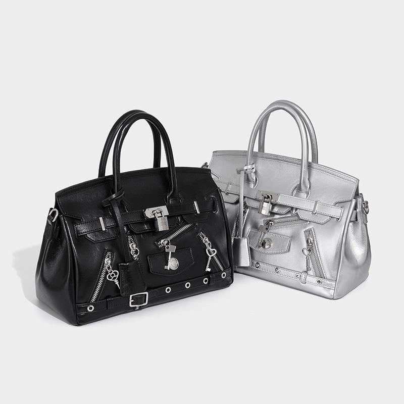 

Niche handbag bag women s bag 2025 new design sense large capacity platinum Kelly bag shoulder messenger bag чёрный