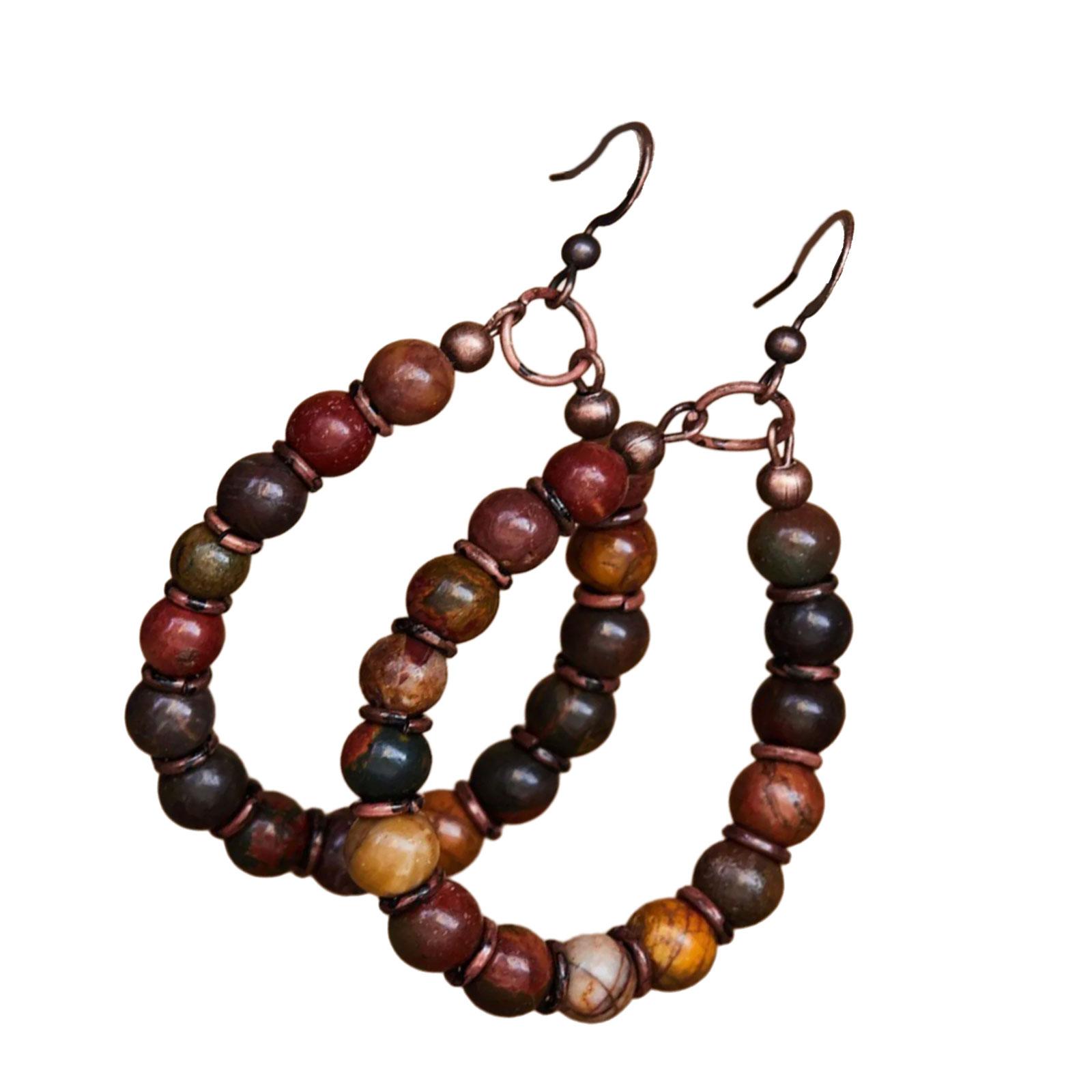 

Серьги-подвески ручной работы в стиле ретро бохо-шик из натурального камня с бисерной подвеской. Идеально подходят для повседневной носки и фестивалей. 1