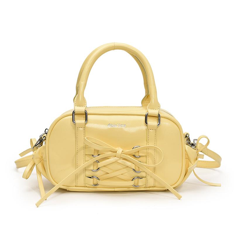 

2025 new simple ballet style lace-up niche portable Boston bag casual niche versatile foreign style messenger bag жёлтый