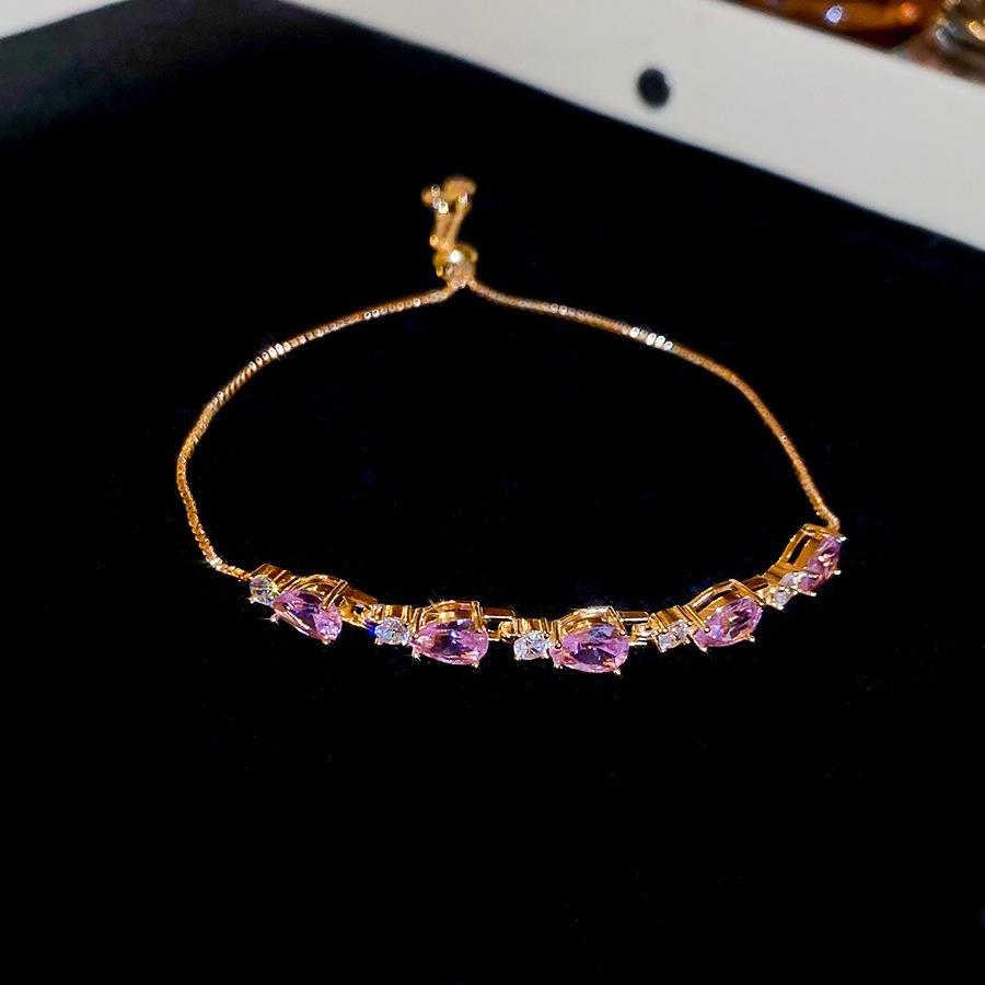 Pink Diamond Zirconia Starburst Flower Bracelet: Trendy, Luxurious Jewelry with Unique Design.