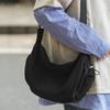 Bag women's large capacity 2025 new solid color casual shoulder messenger bag class commuting niche design dumpling bag