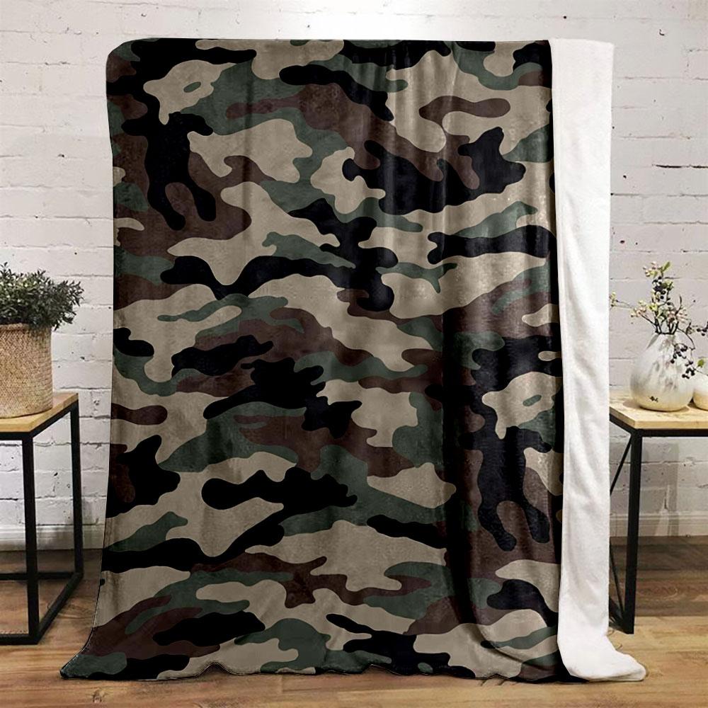 The image features a green, brown, black, and beige camouflage pattern. for all seasons blanket lunch break throw gift