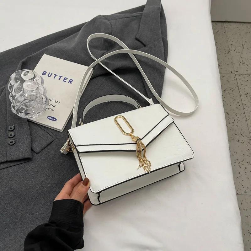 Monochromatic shoulder bag with tassel simple Western style square bag portable bag small bag