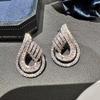 Celebrity high-end stud earrings for women, water drop hollow design stud earrings, light luxury urban trend