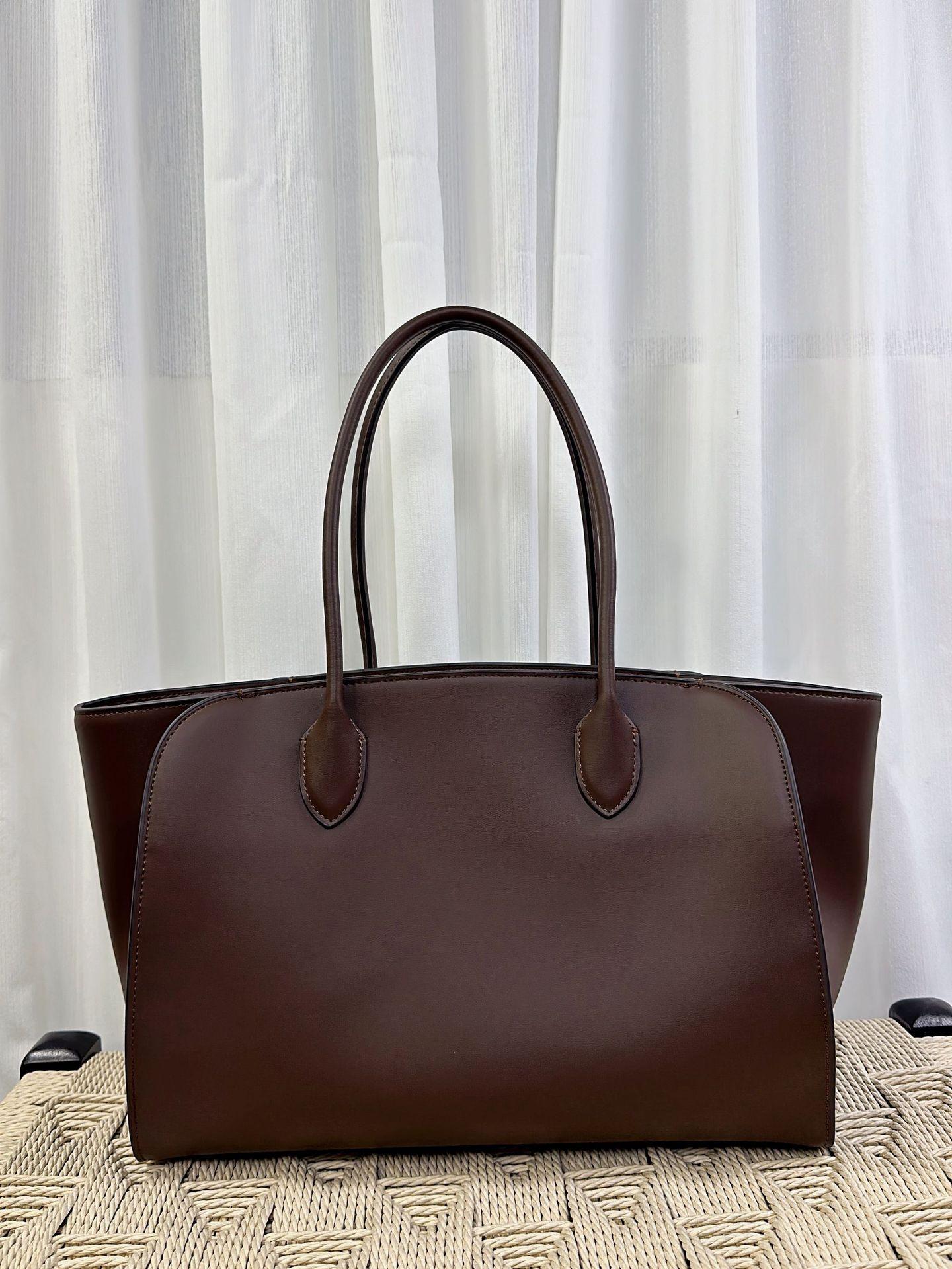 

Ряд Сверхпростой Стиль Маленькая Вместимость Пакет Воловья Кожа Большая Вместимость Сумка Ручной Работы Натуральная Кожа Дышащая Сумка Через Плечо Женская 35.5x28x13cm кофейный