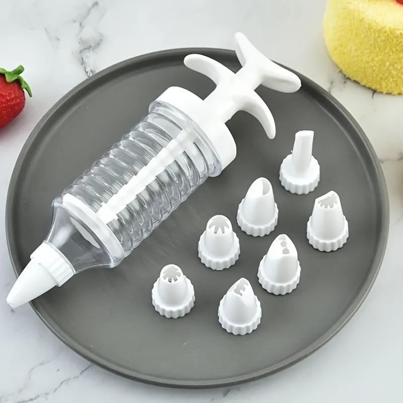 

8Plastic Decorating Tool Set Configuration8A nozzle - Heavy-duty cream squeezer set Suitable for cake decoration Icing and Decorating Gel/Soap 8Pieces