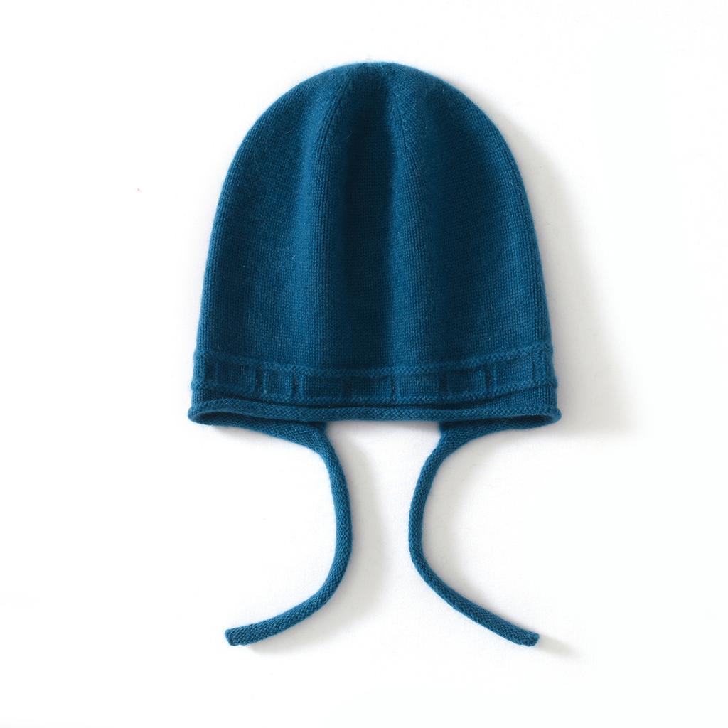 Autumn and winter new fashion personalized cashmere hat women's new lace-up hemming casual age-reducing ear protector ponytail hat