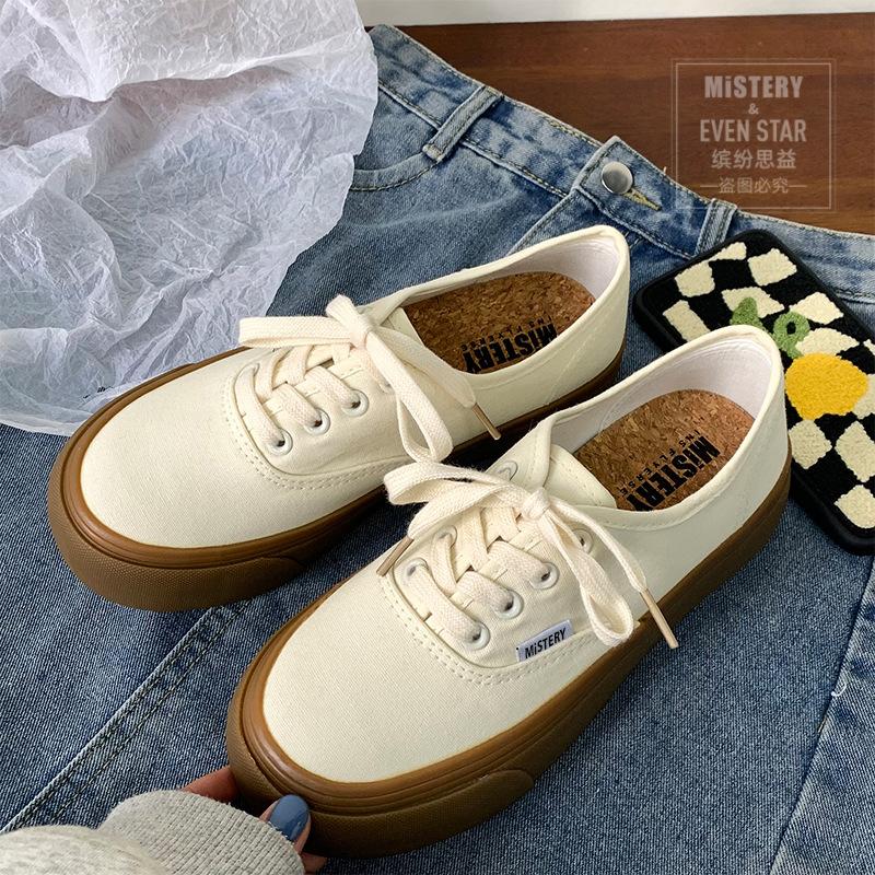 Black and white plaid shoes women's new round head canvas shoes women's shoes 566