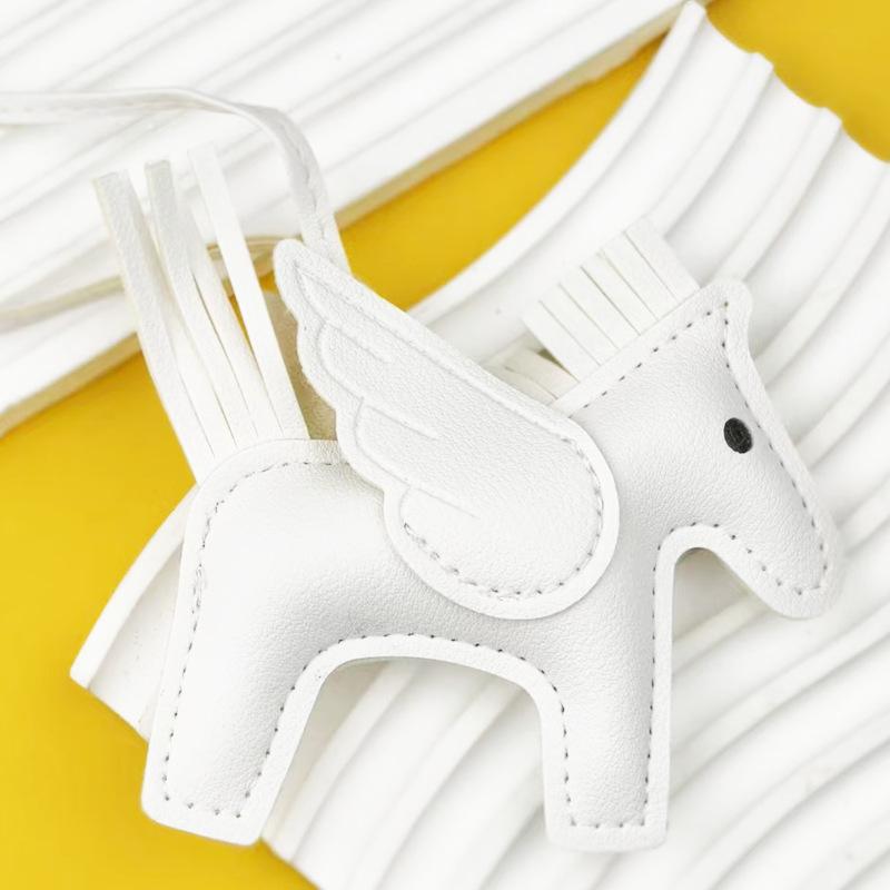 

Cross-border pu leather small pegasus bag pendant pony fringed car keychain pendant cartoon boutique accessories littlepegasus
