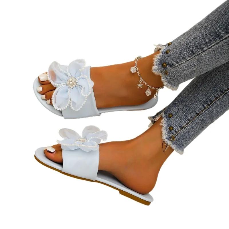 

Модная обувь для женщин 2024 года, брендовые летние женские тапочки, однотонные цветы, бисерные украшения, открытый носок, легкие пляжные тапочки на низком каблуке для женщин 36 синий